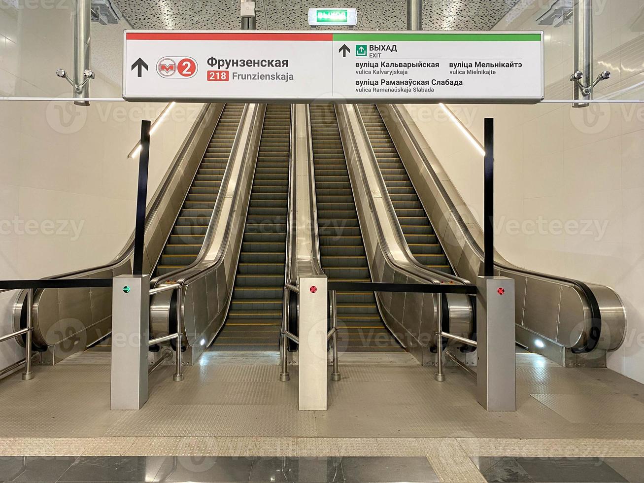 Modern luxury escalators with staircase Escalator in Community Mall, Shopping Center. Moving up staircase. electric escalator. Close up to escalators. Close up floor platform. bands. metal line photo