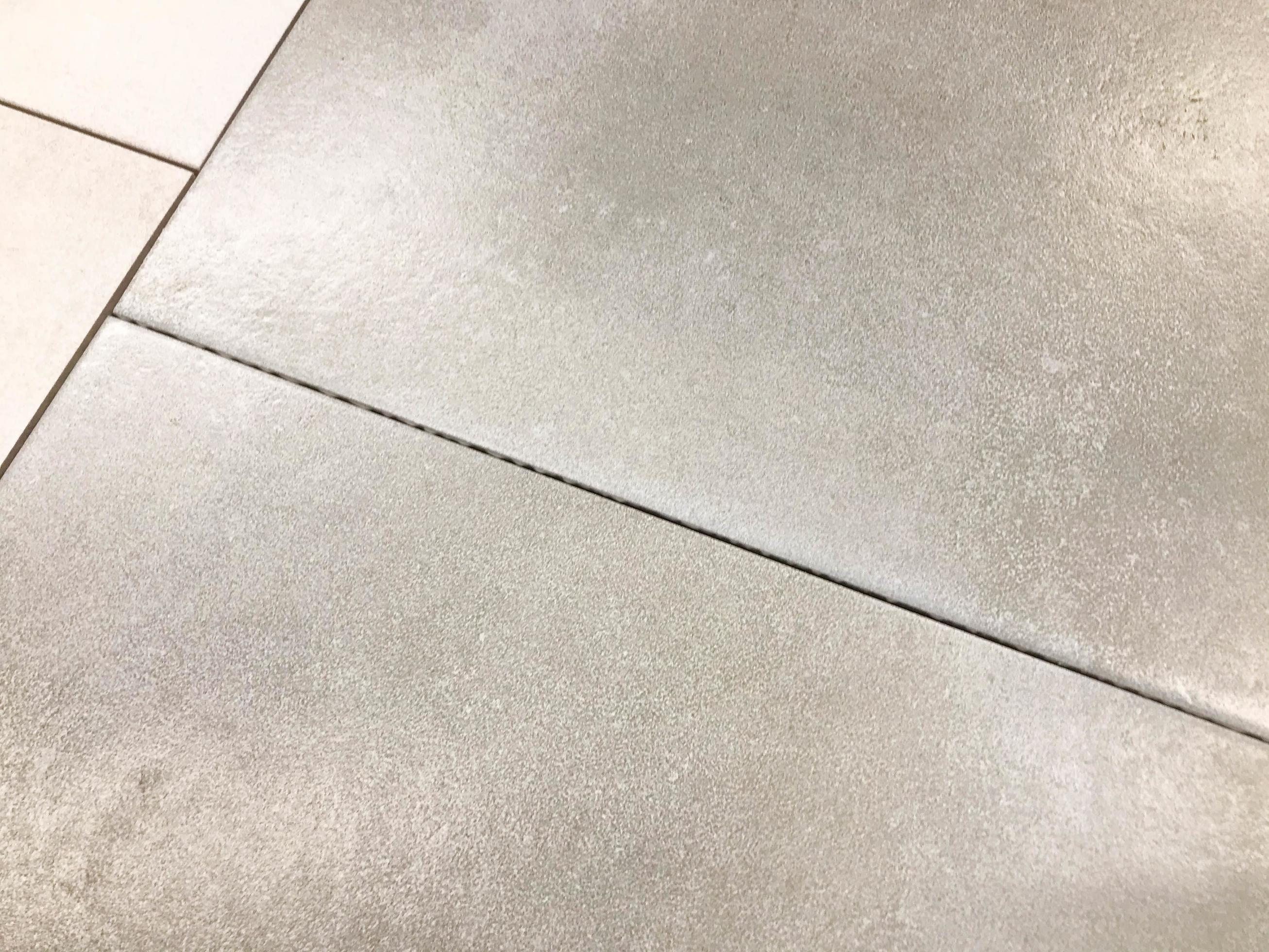 texture, floor and wall tiles. gray tiles with a concrete gap inside