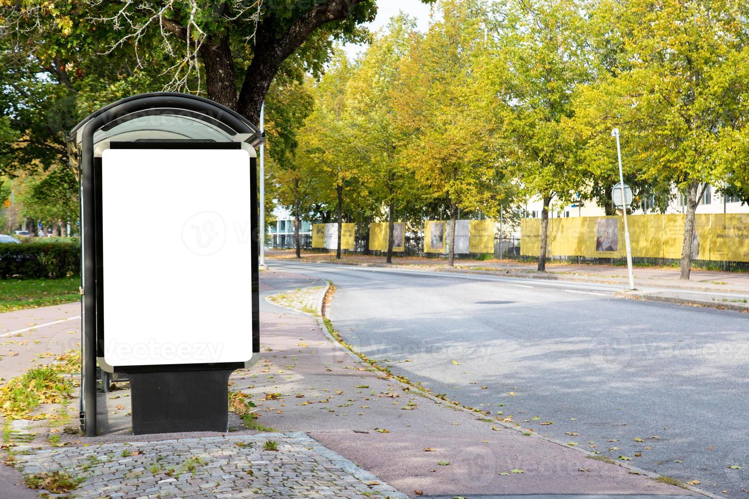 Blank billboard mock up on city road for text message or content. photo