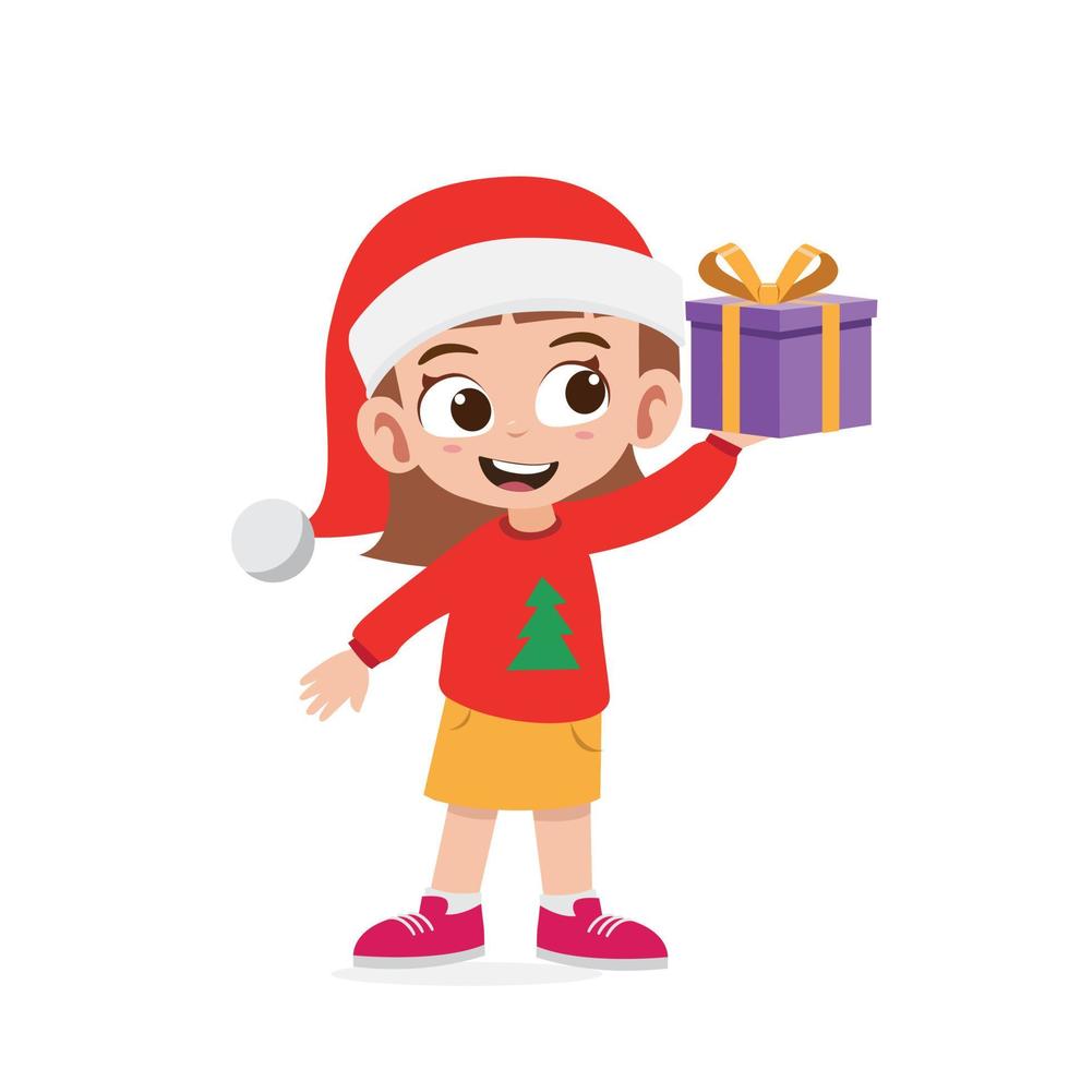 Happy cute little girl holding present for christmas vector