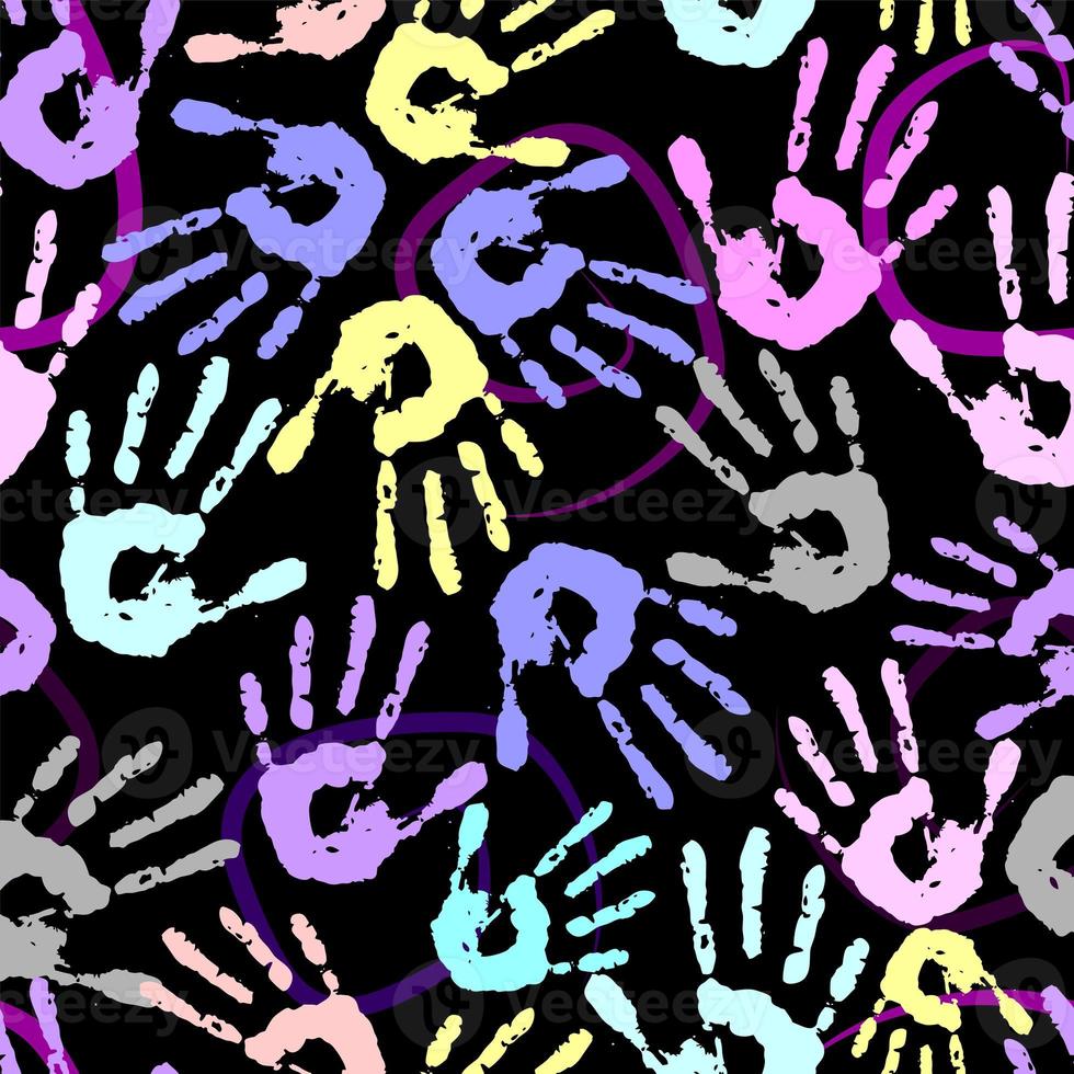 seamless pattern of colored handprints on a black background, repetitive texture, design photo