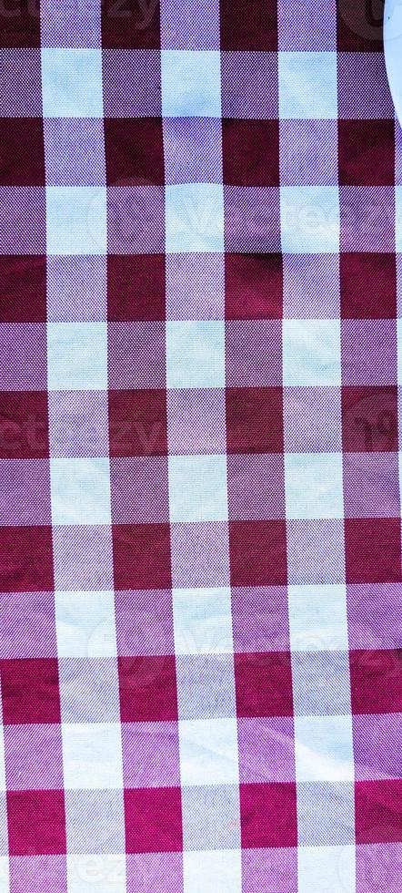 red and white checkered italian picnic tablecloth photo