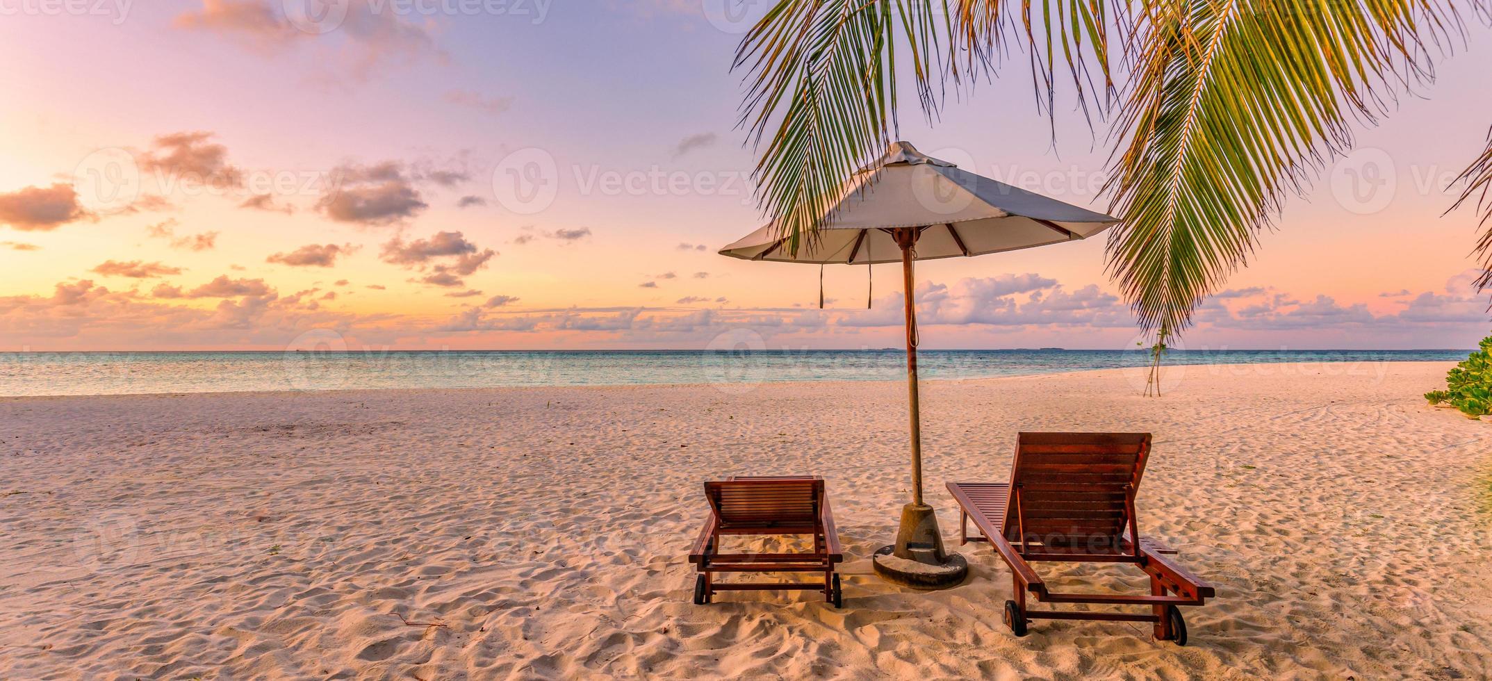 Amazing beach. Chairs on the sandy beach sea. Luxury summer holiday and vacation resort hotel for tourism. Inspirational tropical landscape. Tranquil scenery, relax beach, beautiful landscape design photo