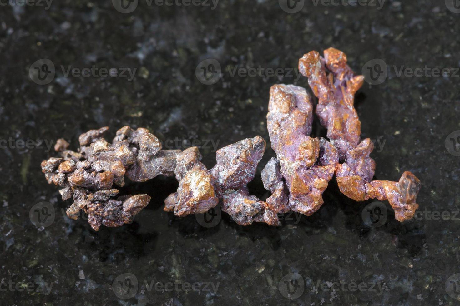 rough native copper on granite background 14776408 Stock Photo at Vecteezy