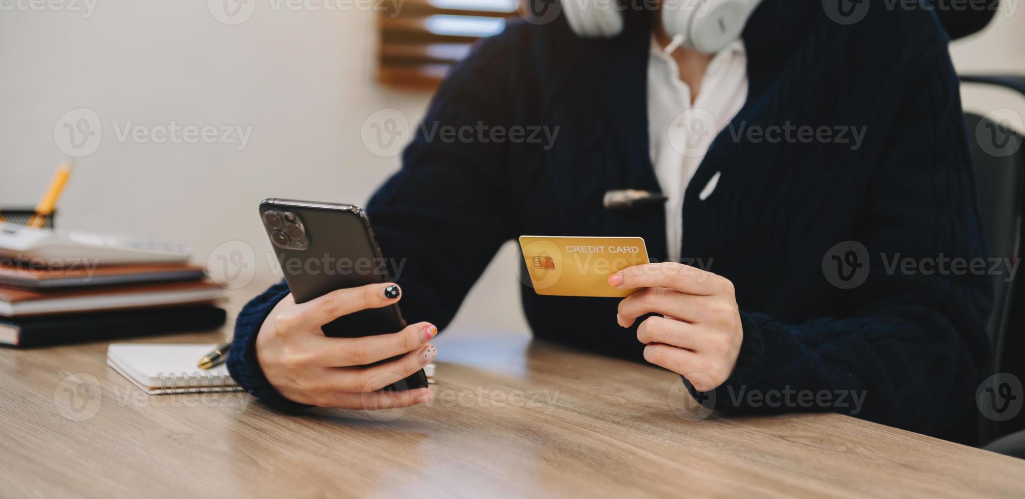 Business woman hands holding credit card with digital layer effect diagram as Online shopping concept photo