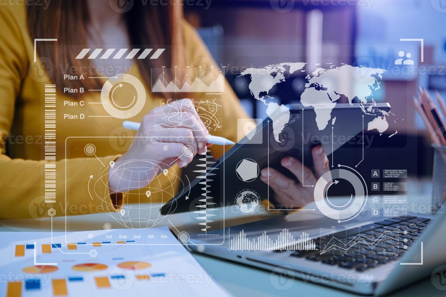 Businessman hand Project manager working and update tasks and Gantt chart scheduling virtual diagram.with smart phone, tablet and laptop in office. photo