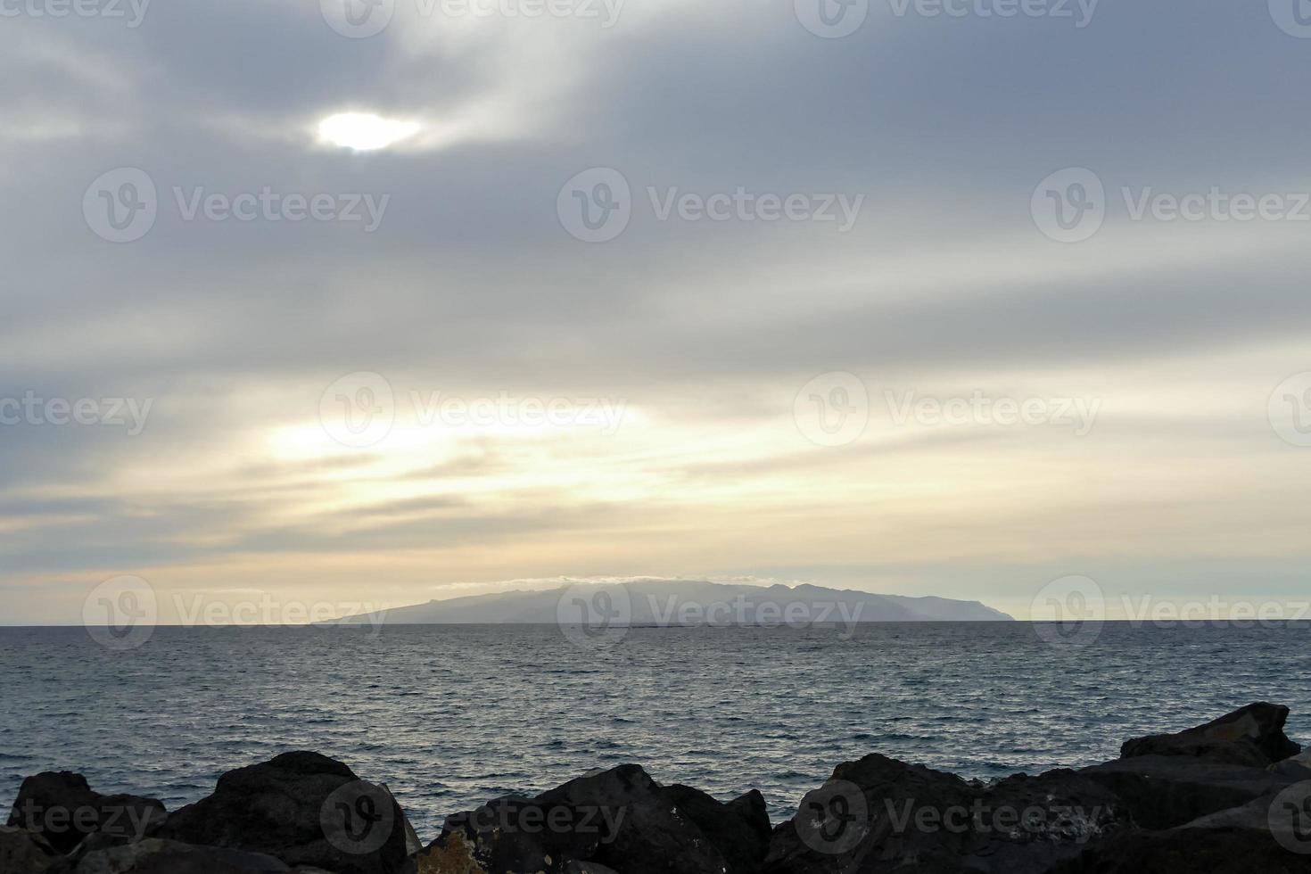 Sunset over the ocean photo