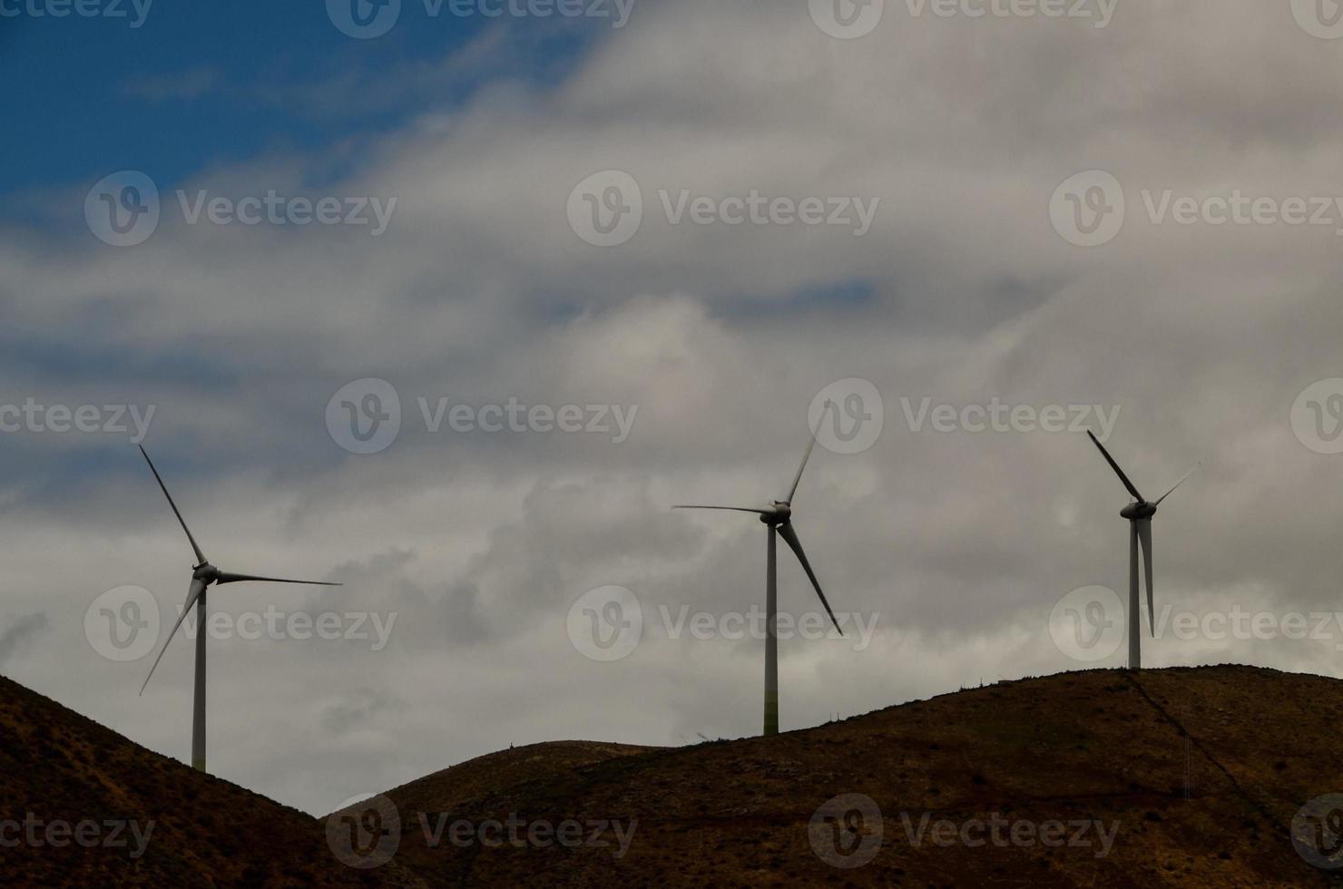 Wind turbines on hills photo