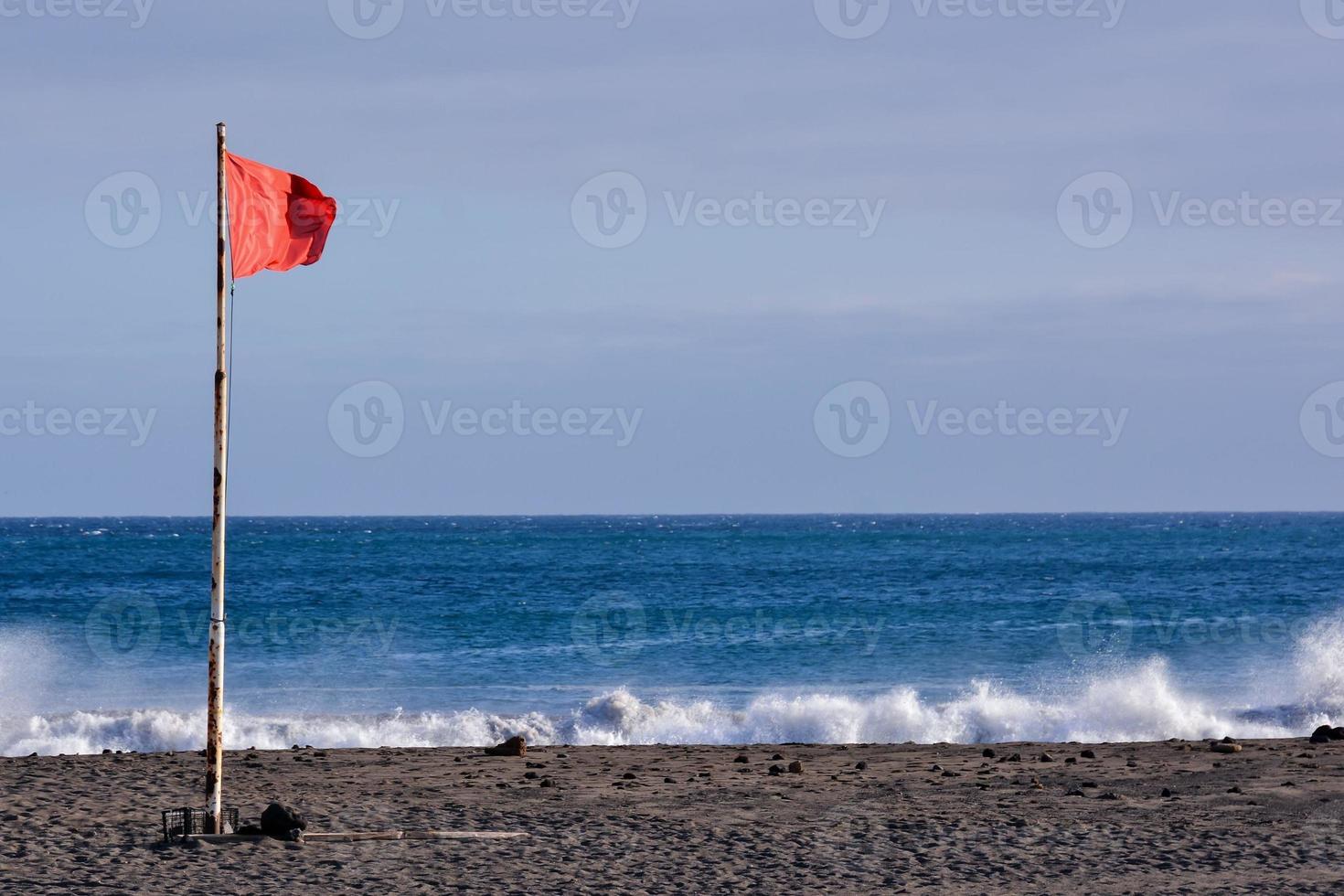 Flag on beach photo