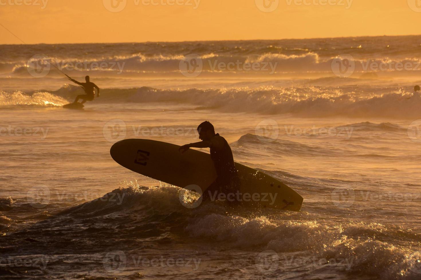 Surfer on water photo