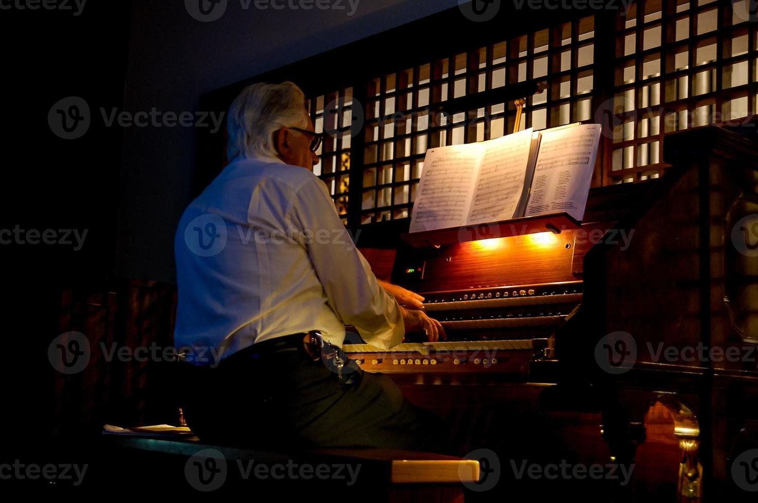 Man playing piano photo