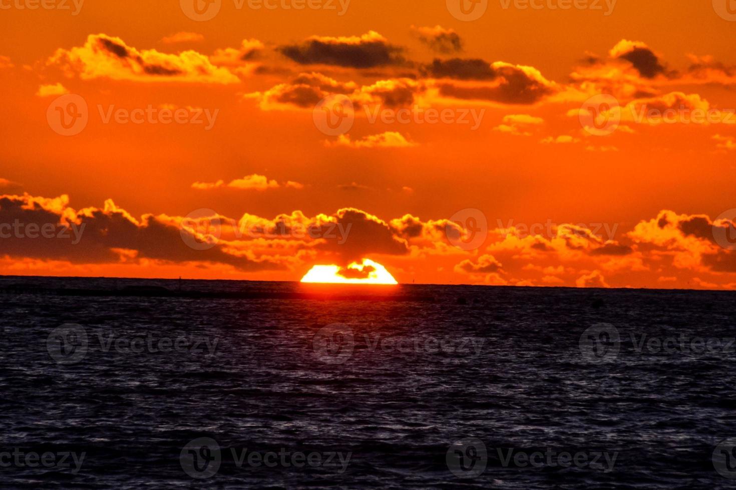Sunset over the sea photo