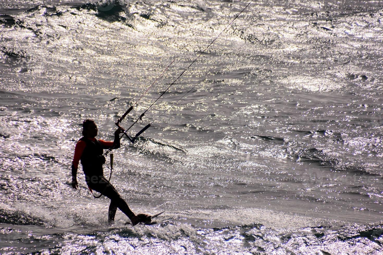 Unidentified kitesurfer on the Canary Islands, circa July 2022 photo