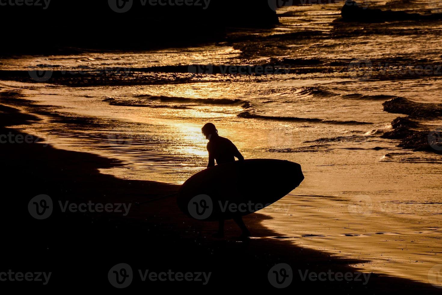 Unidentified surfer on the Canary Islands, circa July 2022 photo