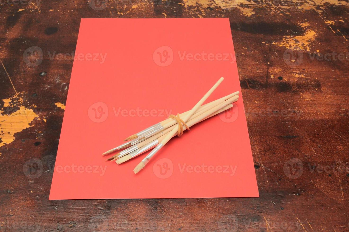 Paper and art materials on the table photo