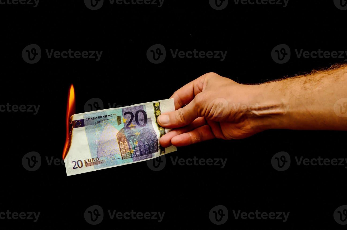 Burning money view photo