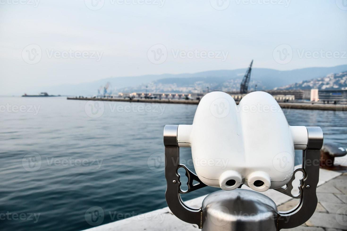 Binoculars over the water photo