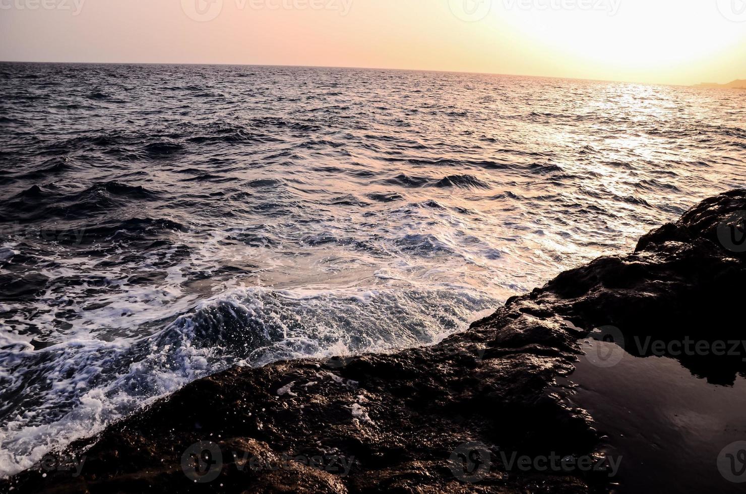 Sunset over the ocean photo