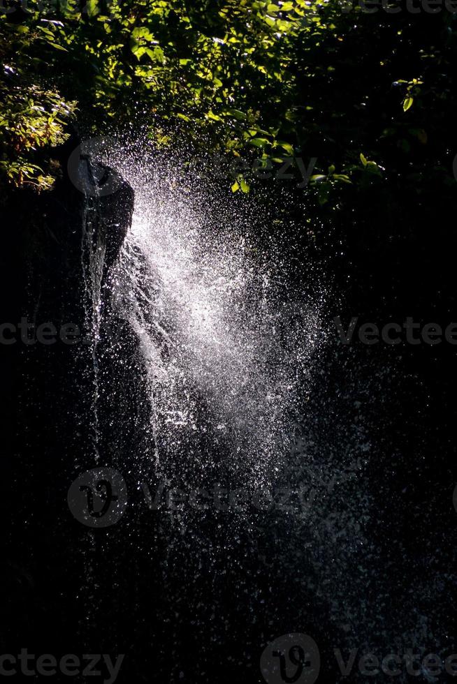 Natural waterfall splash photo