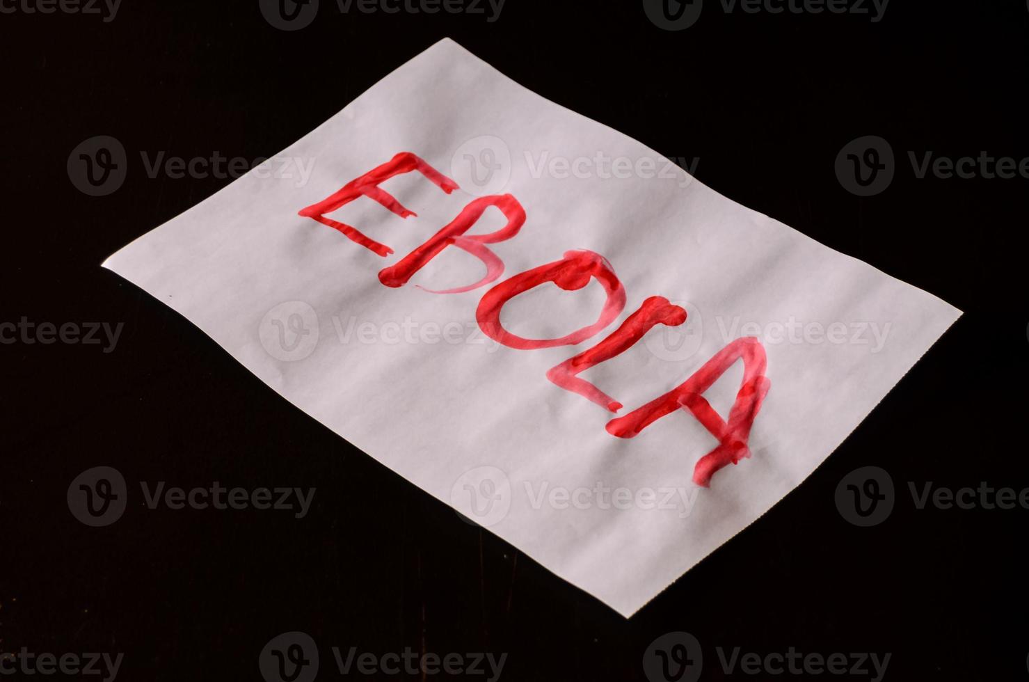 Ebola written on paper photo