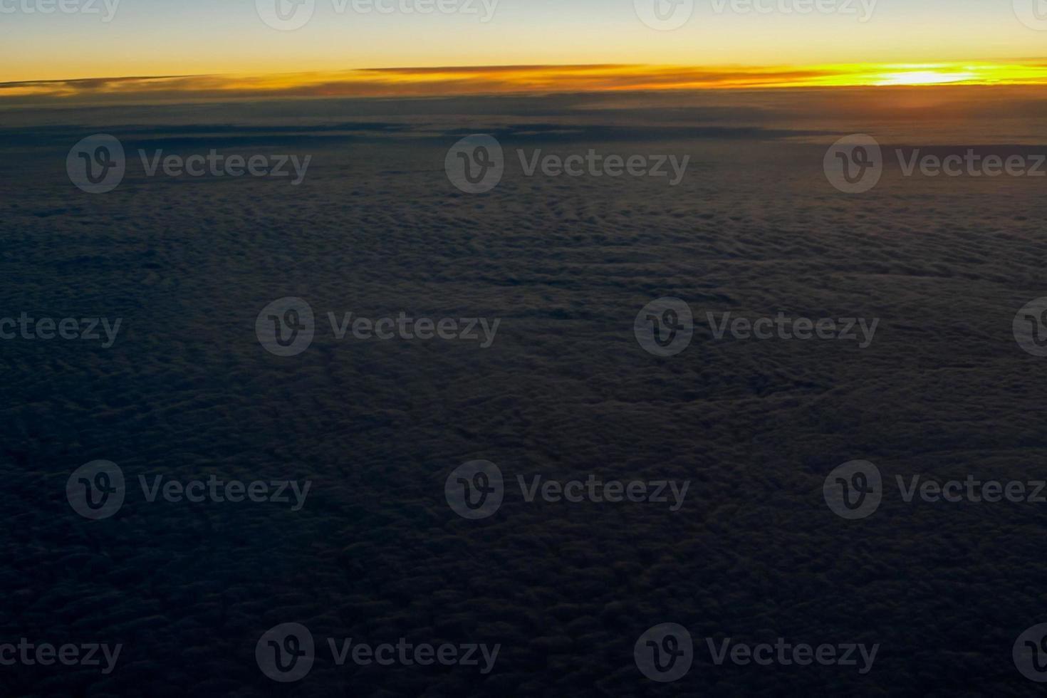 Sunrise on clouds photo
