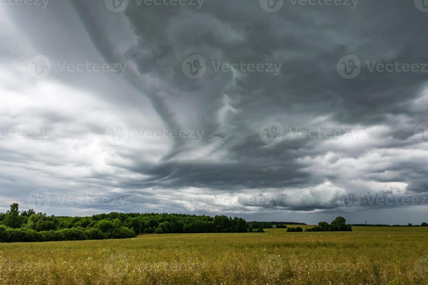 panorama of black sky background with storm clouds. thunder front photo