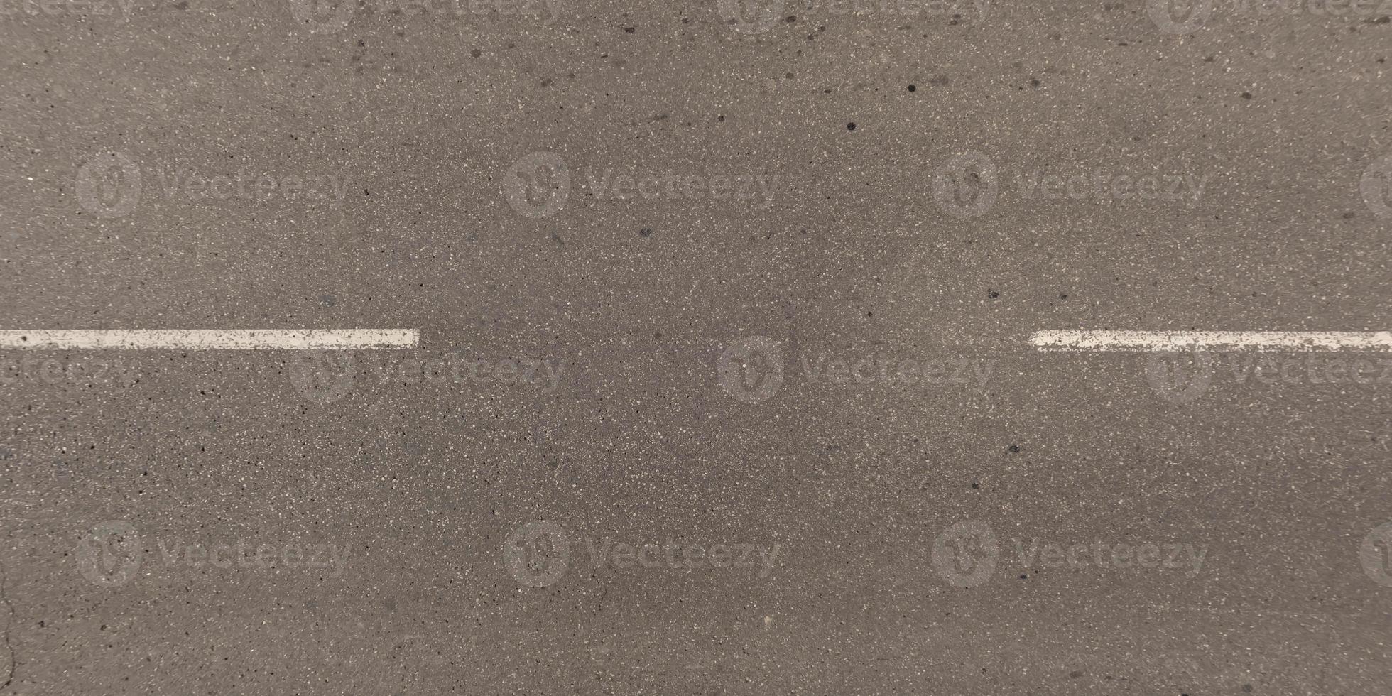 panorama view from above on surface texture of old asphalt road with cracks photo