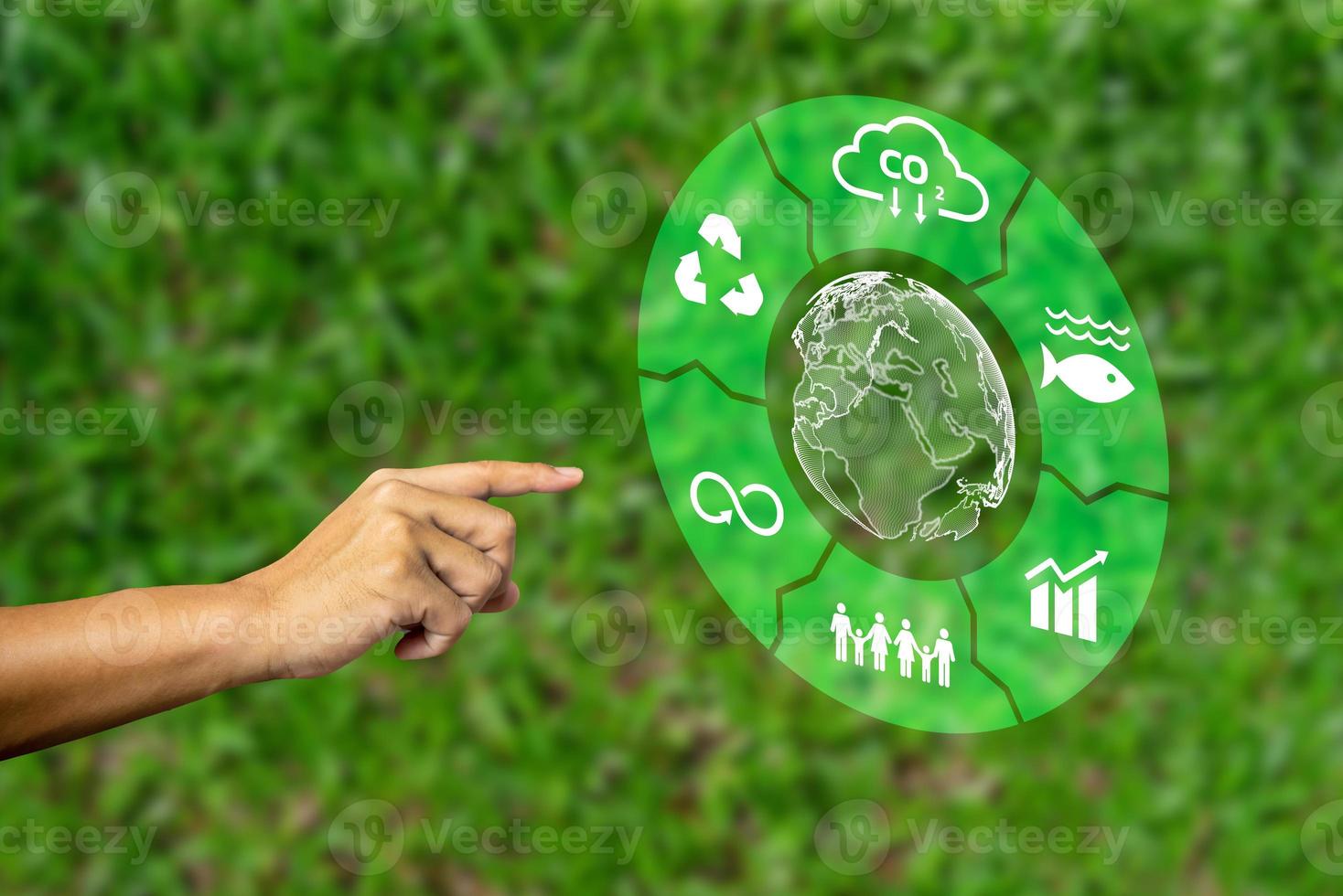 hand with global environmental icons CO2 emission reduction icons warming sustainable development and green business renewable energy clean and friendly environment concept. photo