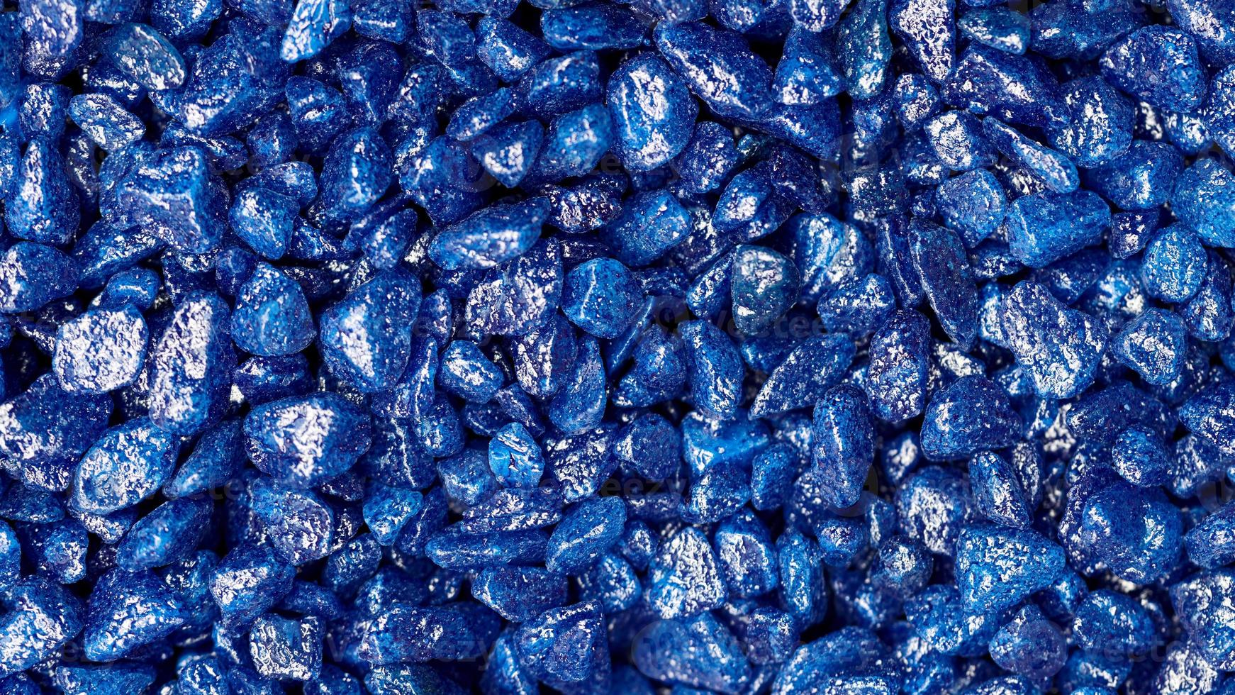 Blue glitter stones for garden decoration photo