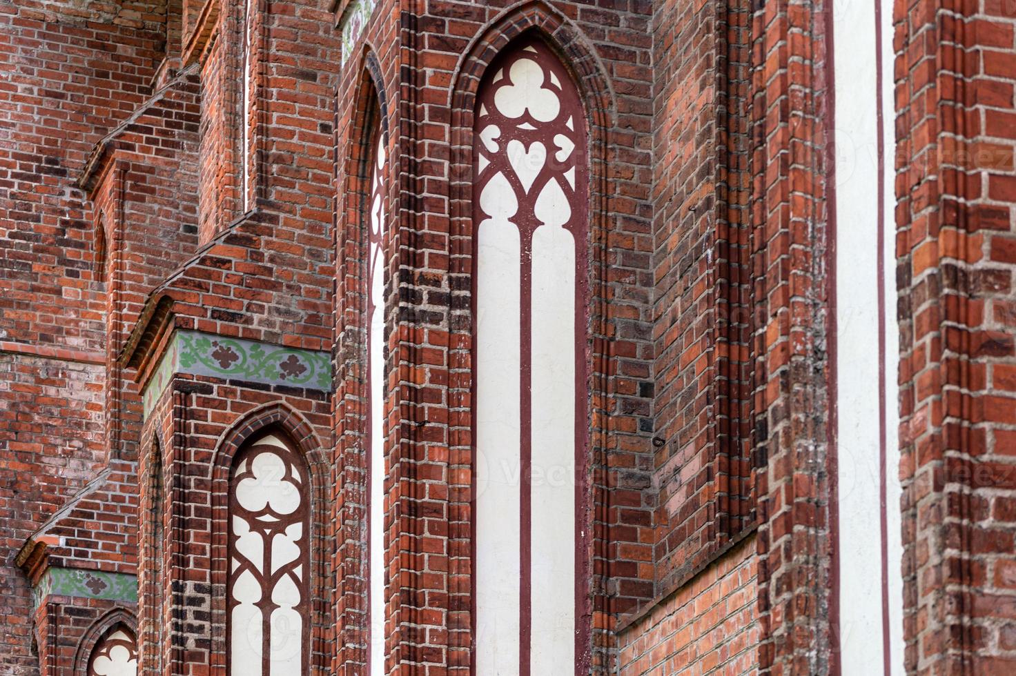 Architectural elements, vaults and windows of gothic cathedral. Red Brick walls. Kaliningrad, Russia. Immanuel Kant island. photo