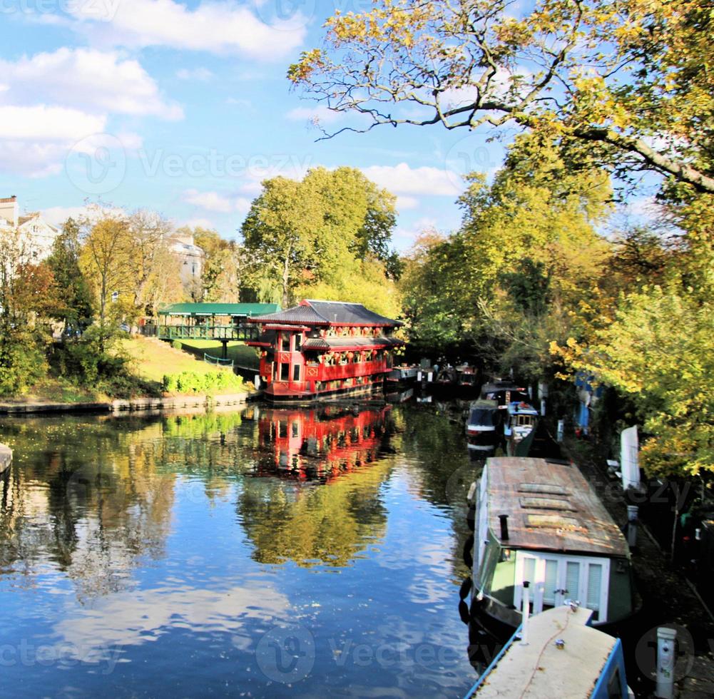 A view of a pond in a park in London photo