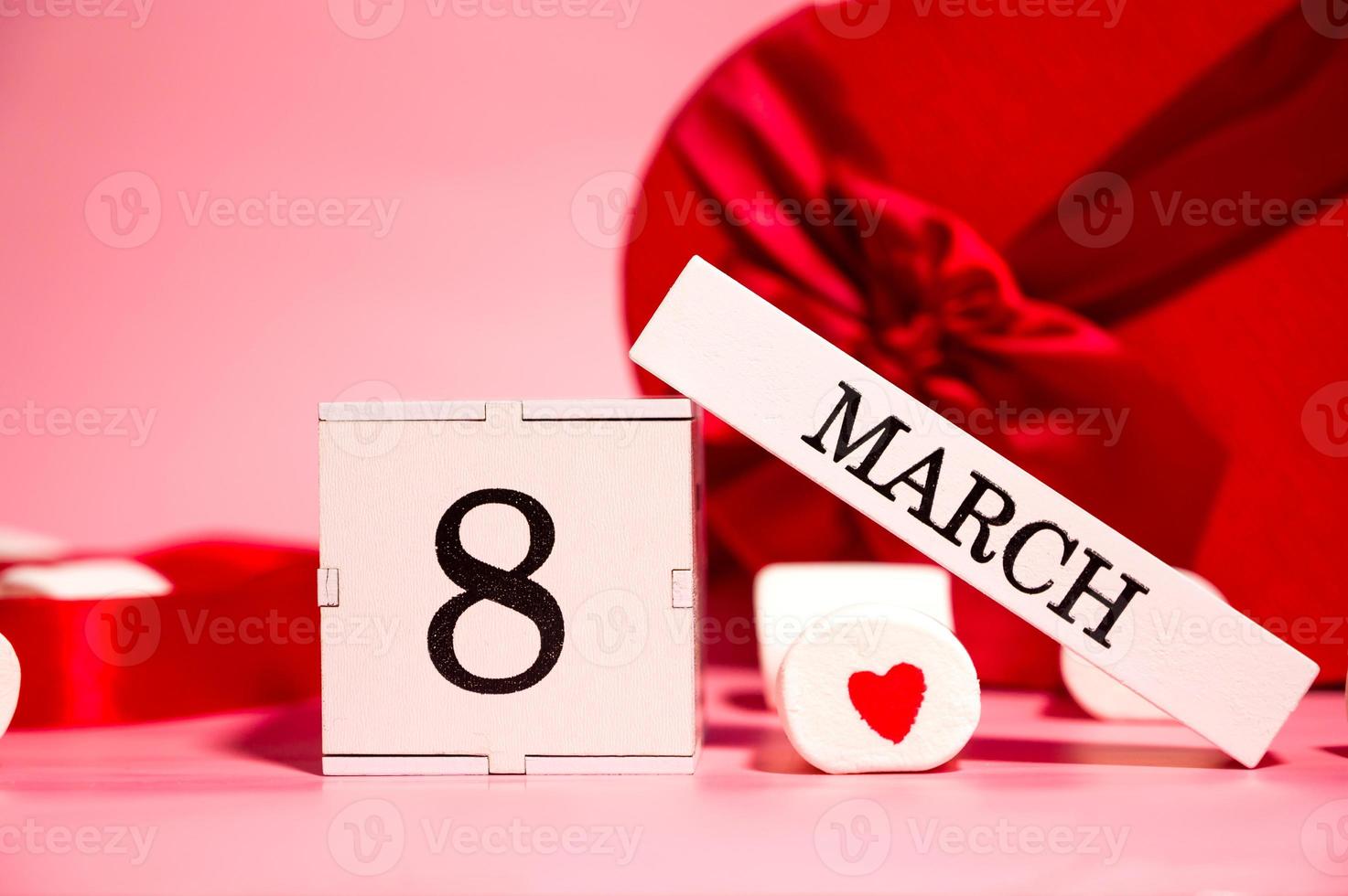 Calendar with 8 march date ,sweets and gifts around.Women's day photo