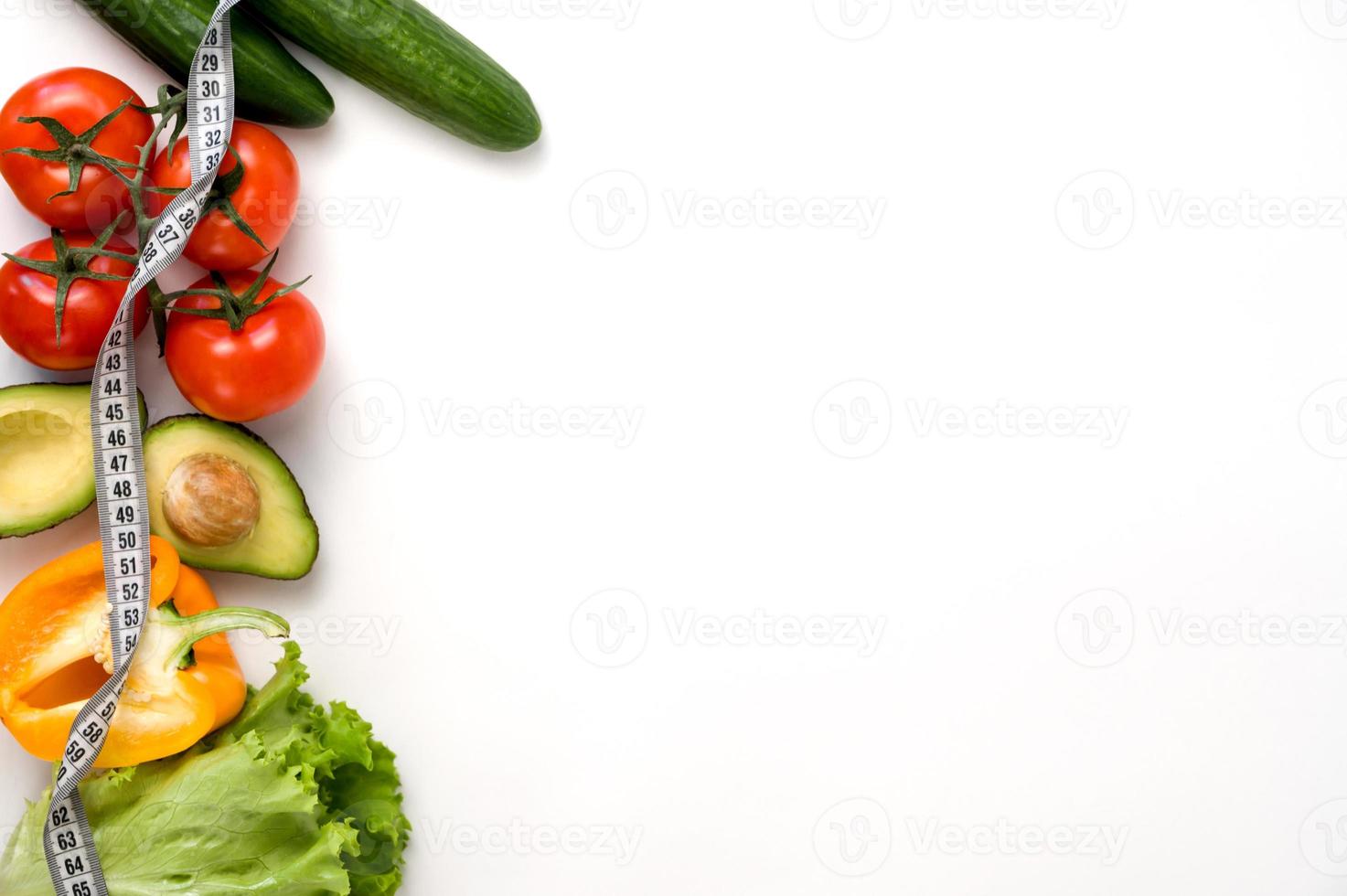 Healthy eating concept. Vegetables and measuring tape.Vegetarian or vegan.Detox concept.Copy space photo