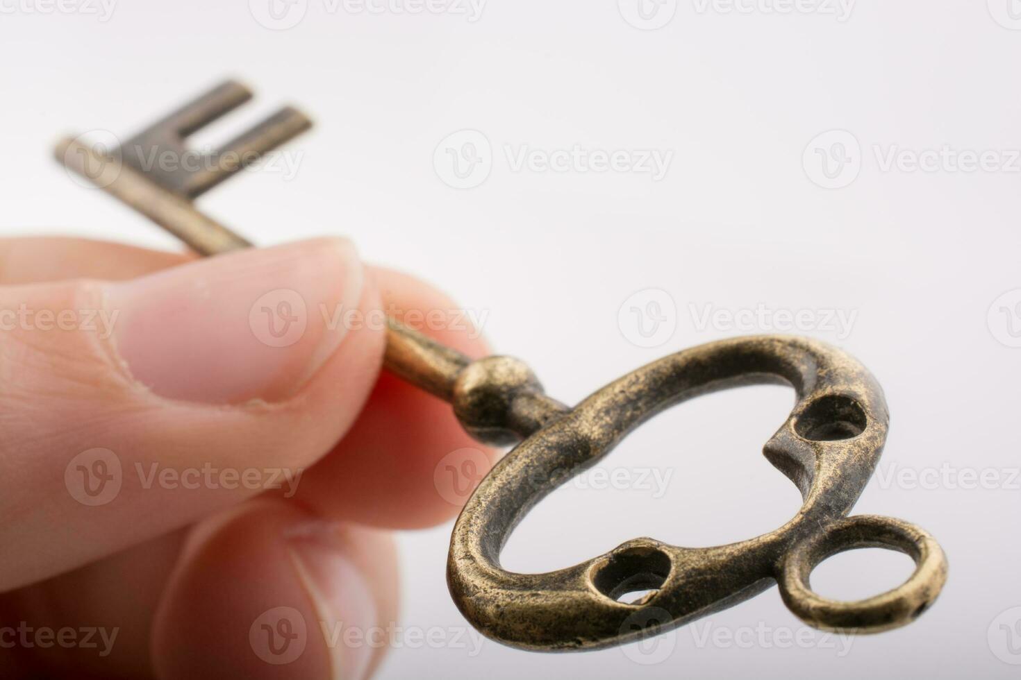 Hand holding key photo