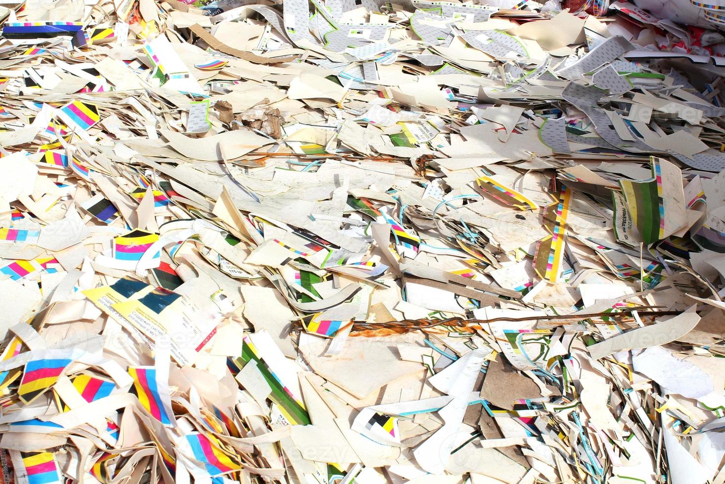 Wastepaper compact texture pile for recycling on sorting plant. Technology of reuse materials. Stack of shredded paper. Save the planet ecology concept. Industry of reduced pollution factory. Close-up photo