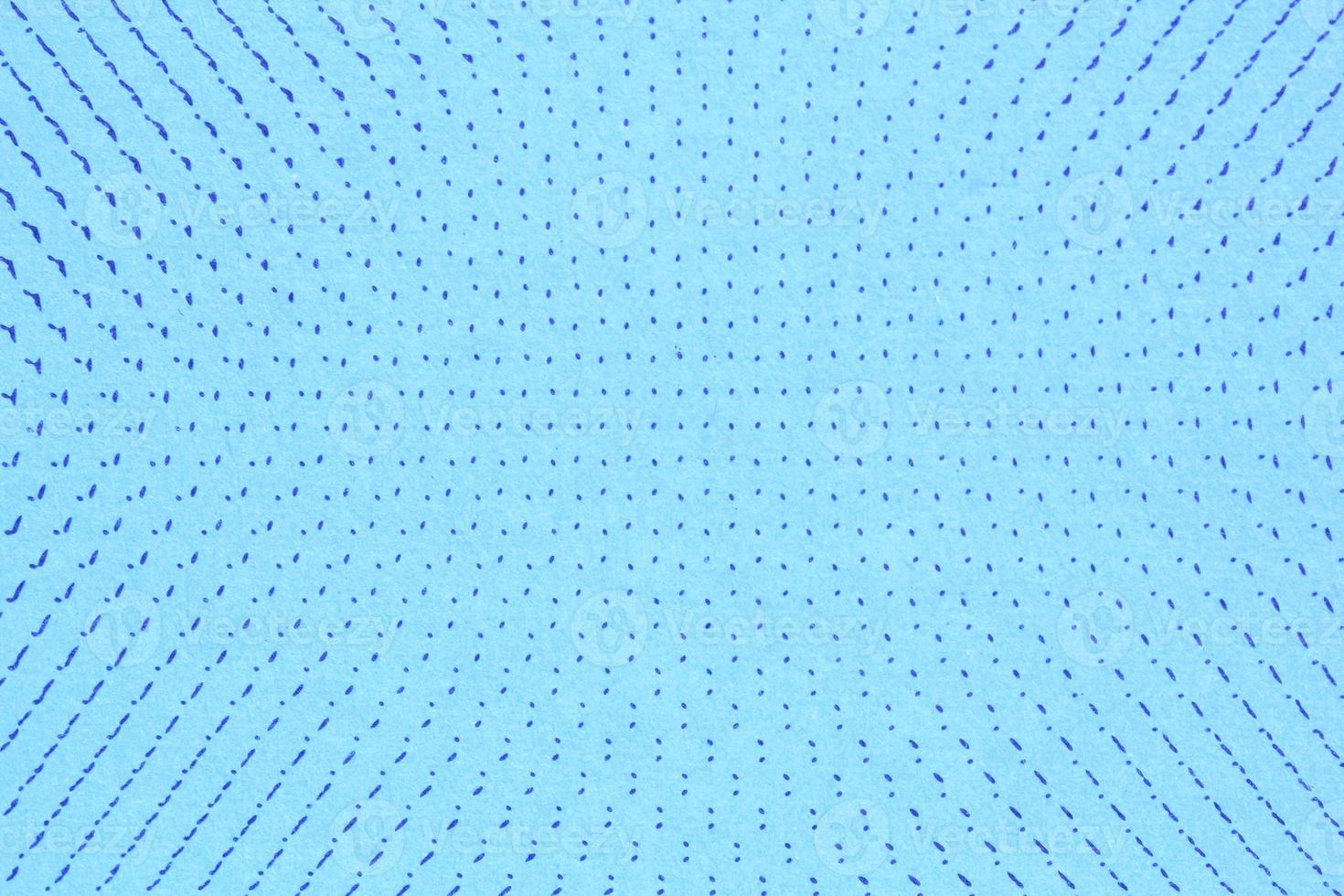 Abstract paper blue geometric symmetrical texture dot surface background. Structure design cardboard shape backdrop. Decoration interior concept. Flatlay, close-up photo
