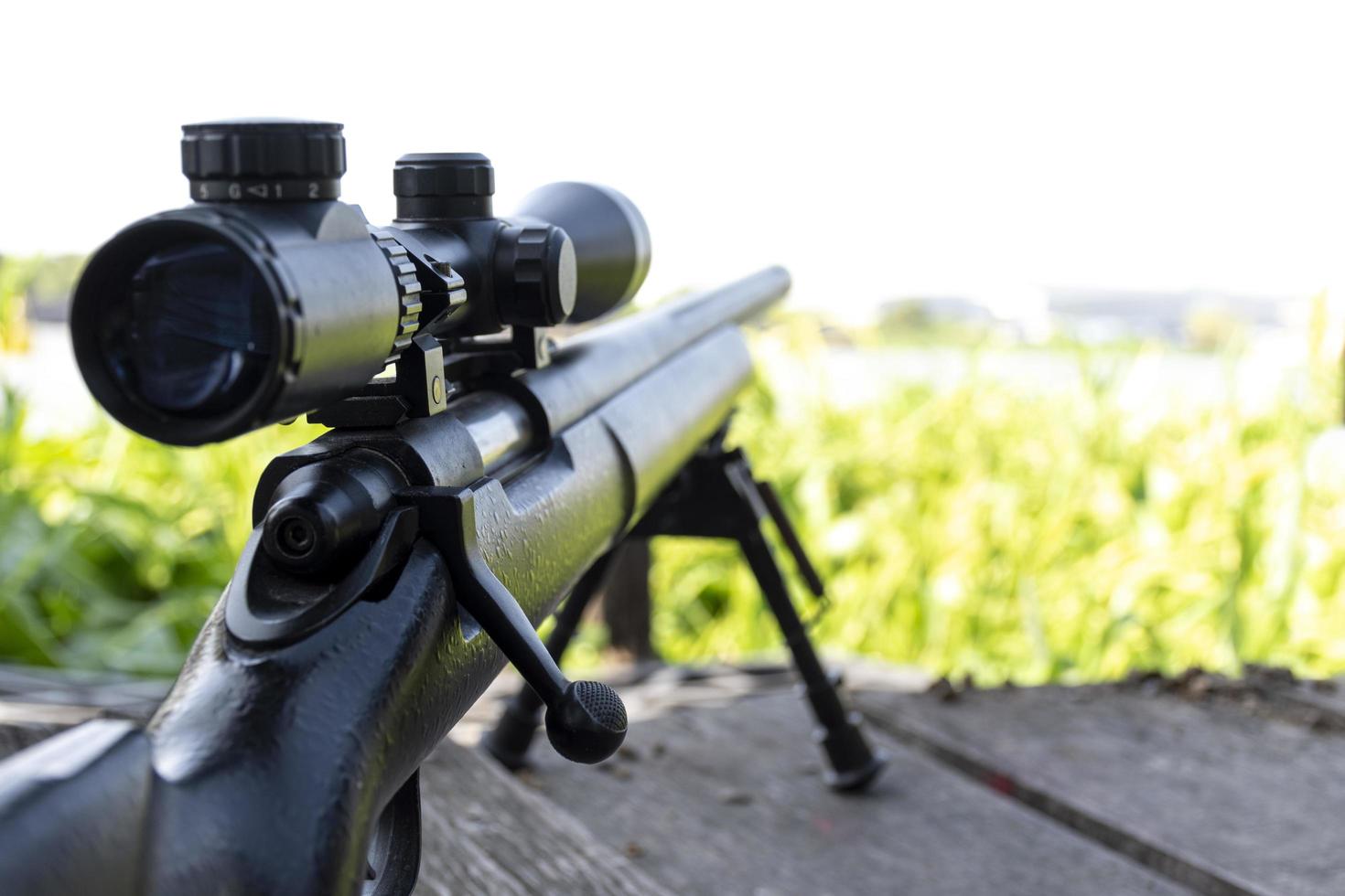 Rifle with a scope and bipod photo