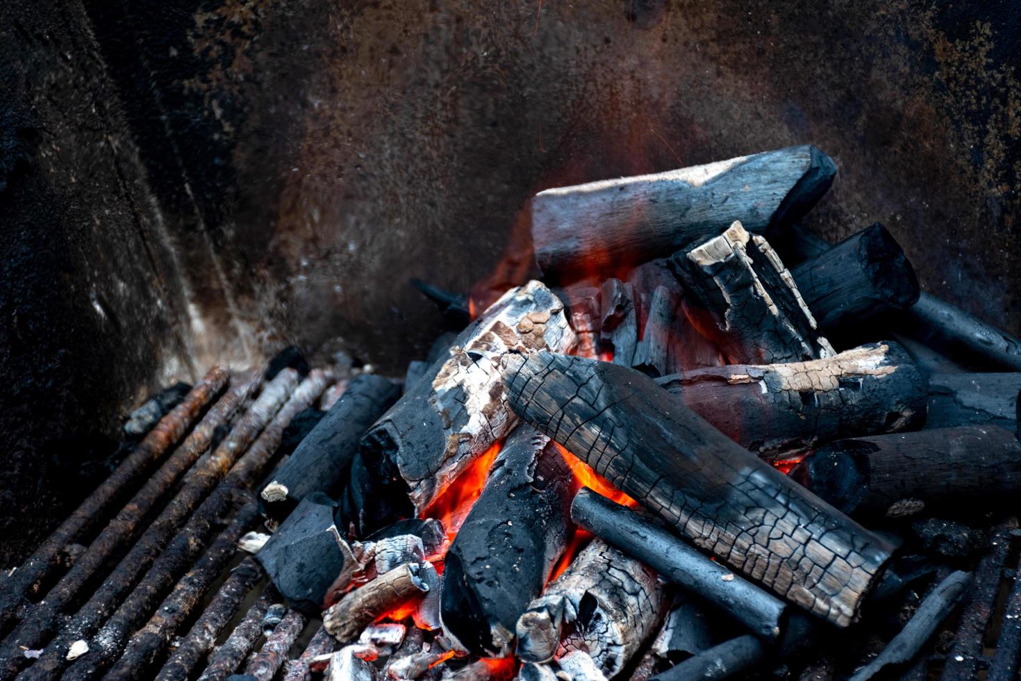 Close up charcoal ash fire burning hot photo