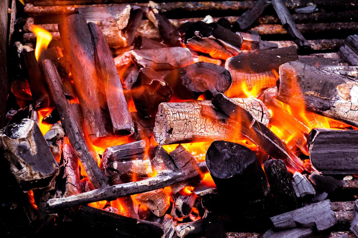 Close up charcoal ash fire burning hot photo