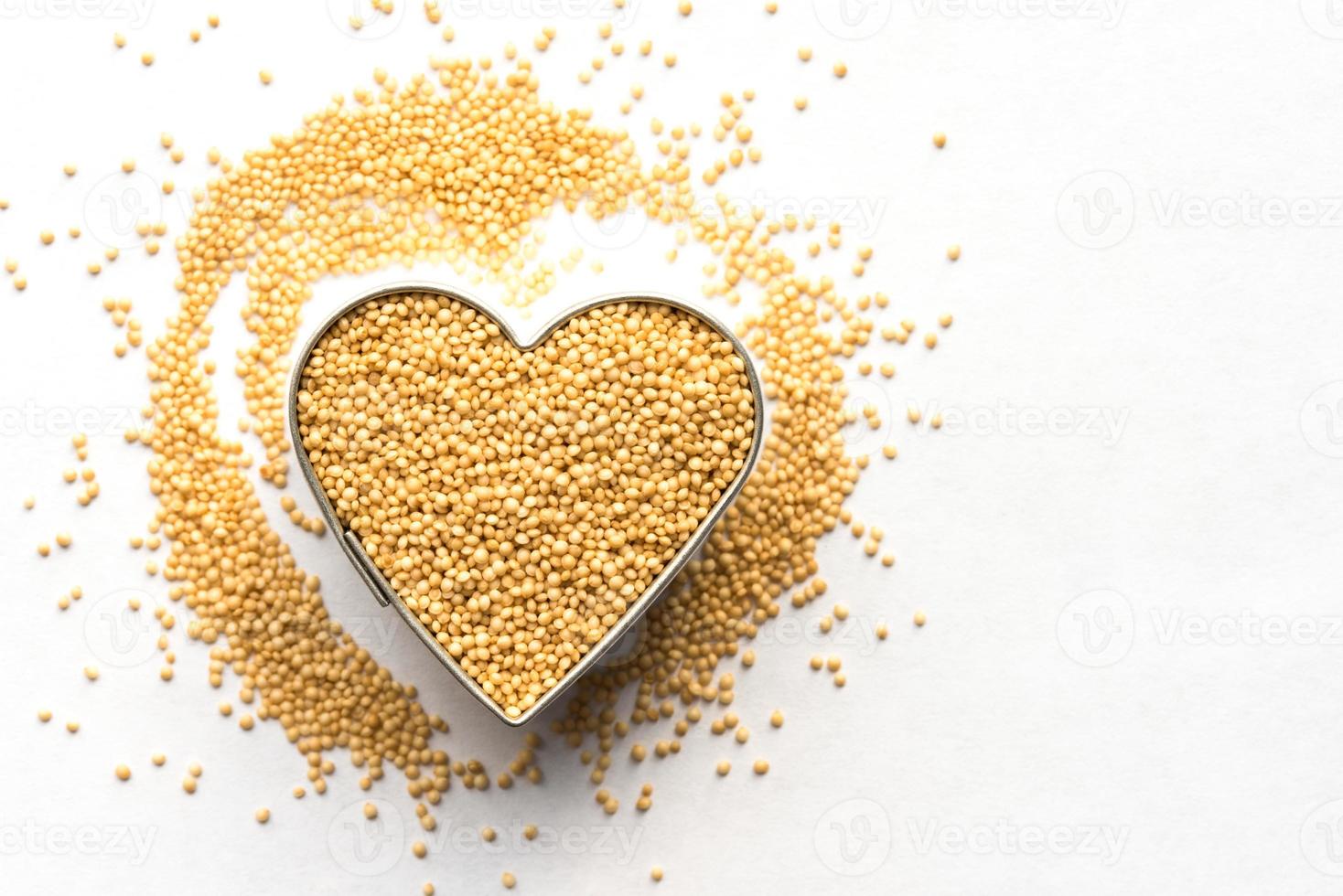 Uncooked Amaranth Grain in a Heart Shape photo