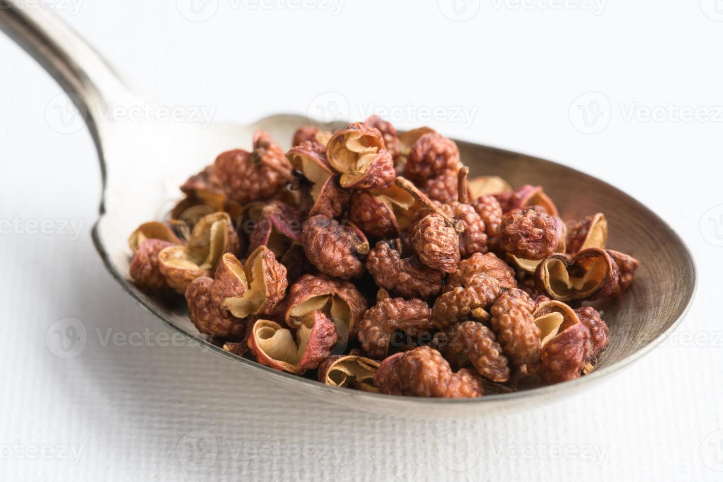 Szechuan Peppercorns on a Spoon photo