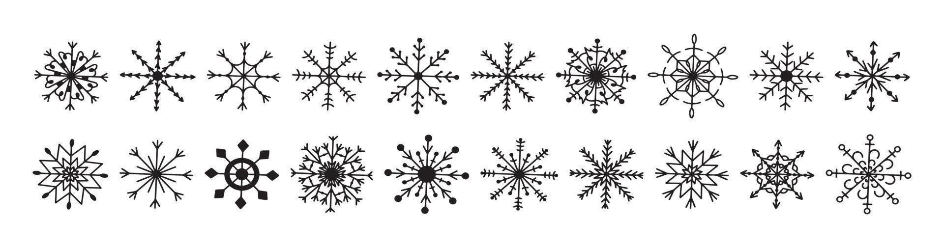 vector plano dibujado a mano conjunto de copos de nieve de navidad.