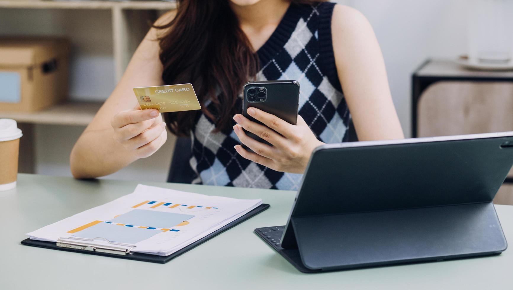 Concept online payment with cradit card. Hand of men using laptop for to payment make online health insurance. photo