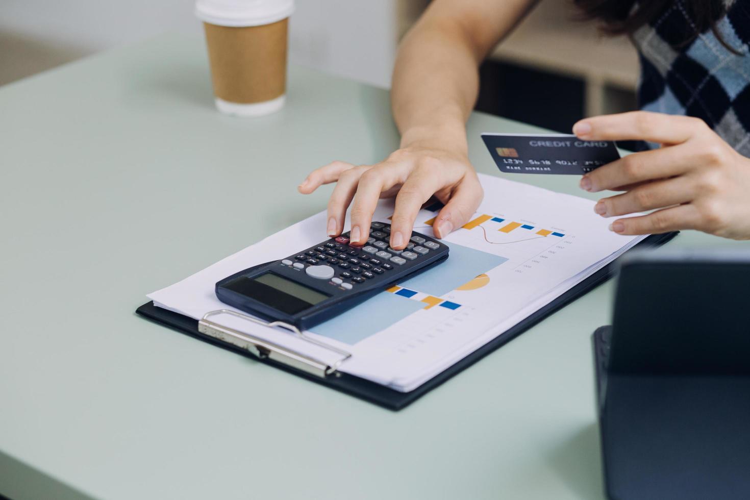Concept online payment with cradit card. Hand of men using laptop for to payment make online health insurance. photo