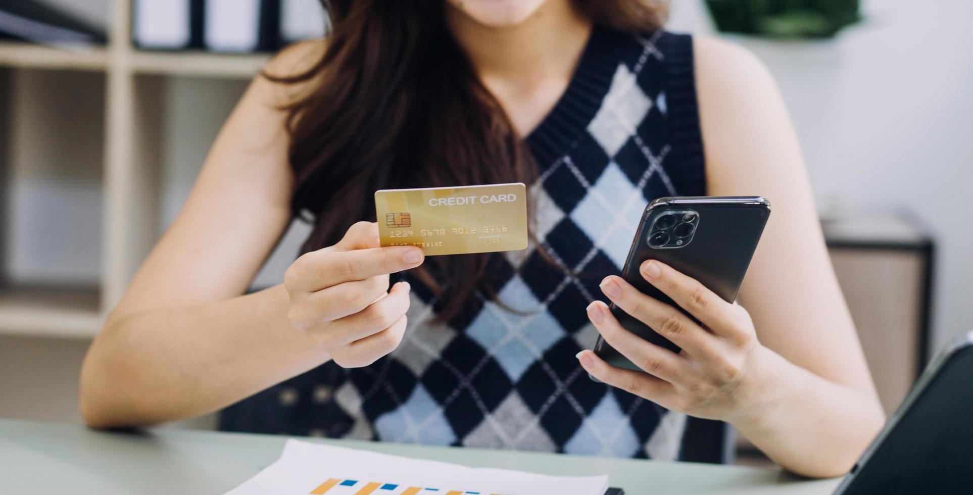Concept online payment with cradit card. Hand of men using laptop for to payment make online health insurance. photo