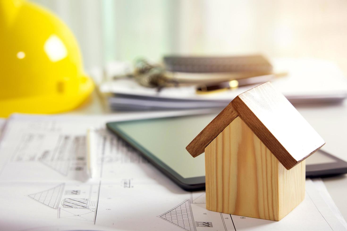 House plan design, house structure blueprint. tablets to design blueprints and analyze building structures. Architect concept, technology in design photo