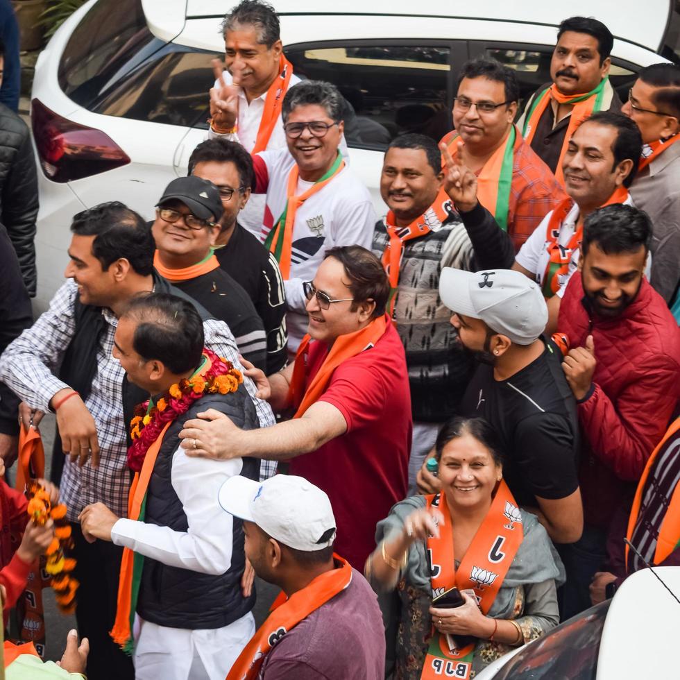 New Delhi, India, November 20 2022 - Bharatiya Janata Party BJP supporters during a rally in support of BJP candidate Pankaj Luthara to file nomination papers ahead of MCD local body Elections 2022 photo
