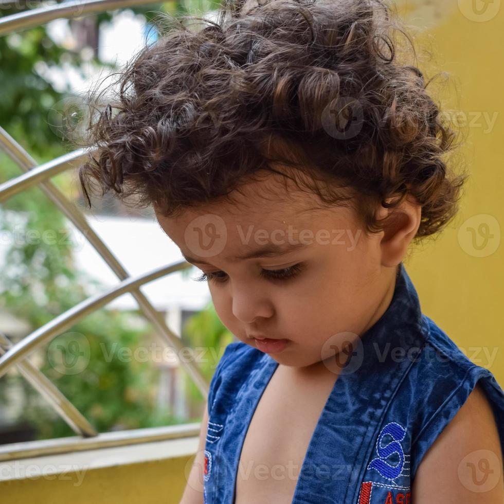 Cute little boy Shivaay Sapra at home balcony during summer time ...