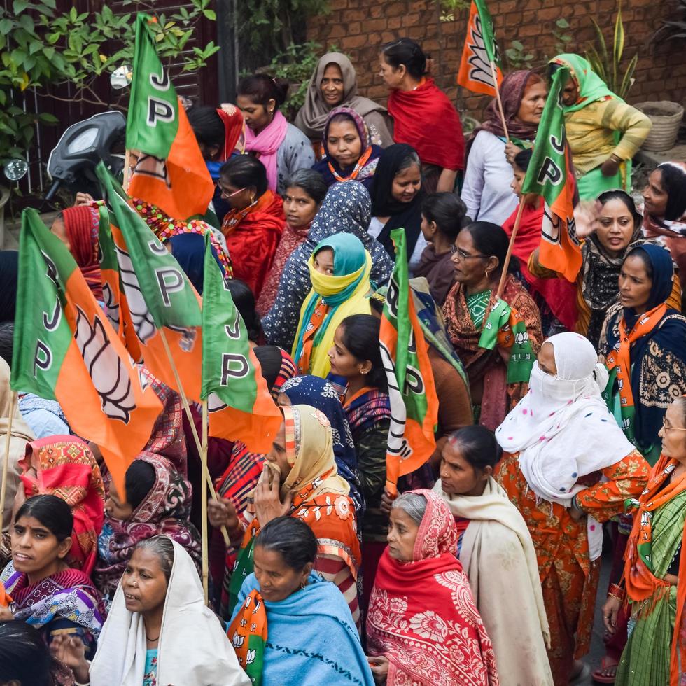 New Delhi, India, November 20 2022 - Bharatiya Janata Party BJP supporters during a rally in support of BJP candidate Pankaj Luthra to file nomination papers ahead of MCD local body Elections 2022 photo