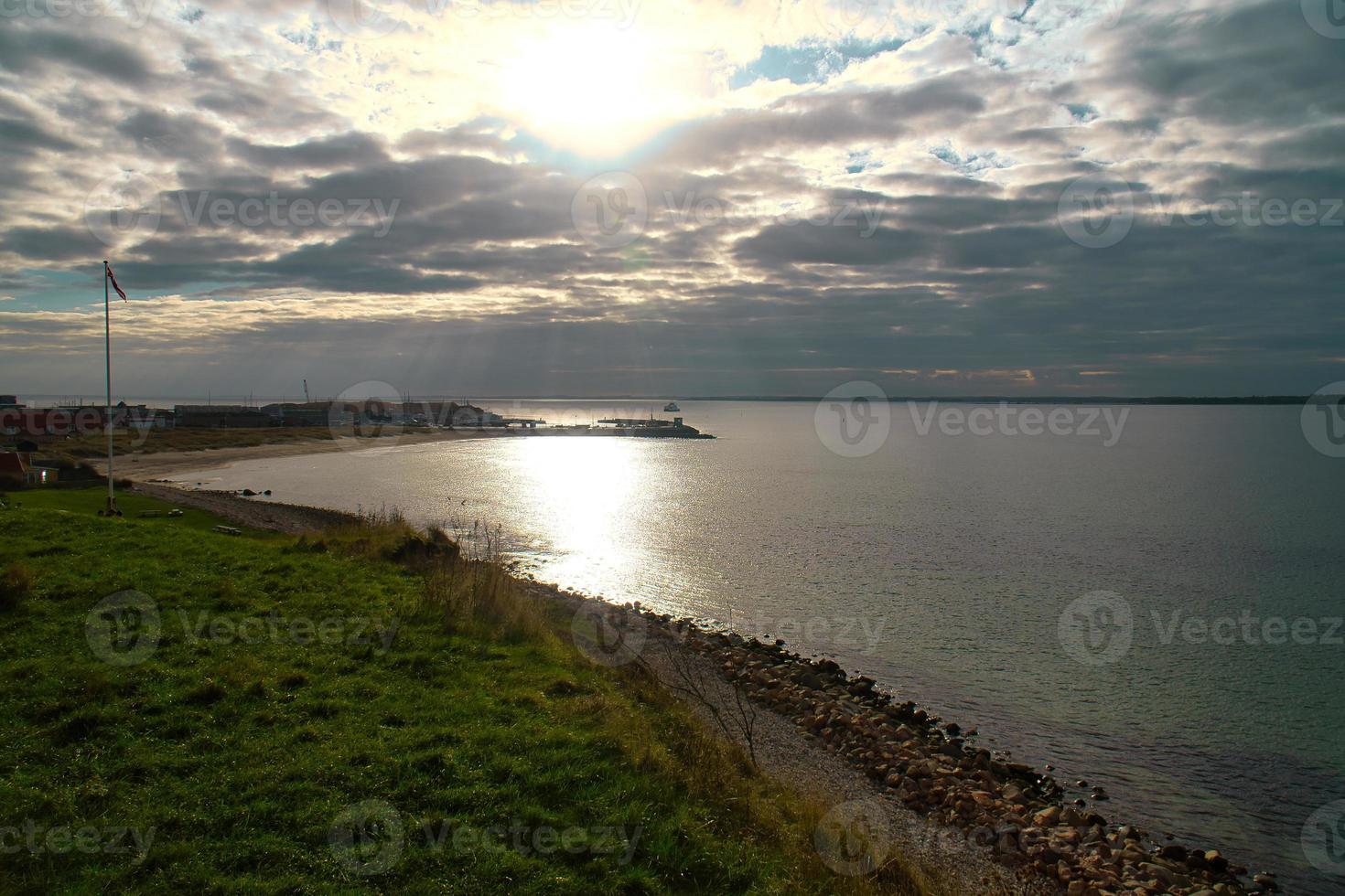 Hundested, Denmark on the cliff overlooking the sea. Baltic Sea coast, grassy photo